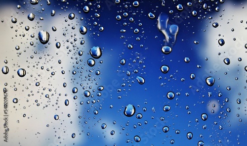 Window glass with condensation natural water drops on window glass.