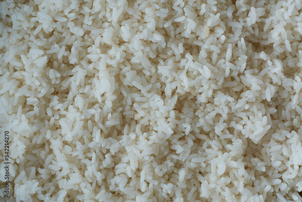 cooked or boiled white brown rice, full frame background, closeup view taken from above cooked or boiled white brown rice, full frame background, closeup view taken from above
