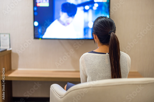 Woman watch TV at home