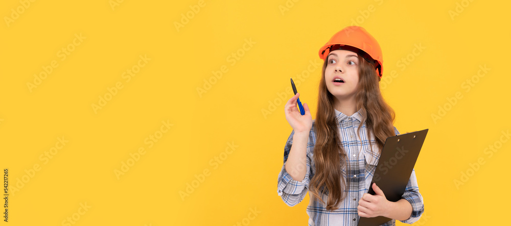 concentrated child worker wear hardhat hold clipboard. childhood development. Child in hard hat horizontal poster design. Banner header, copy space.