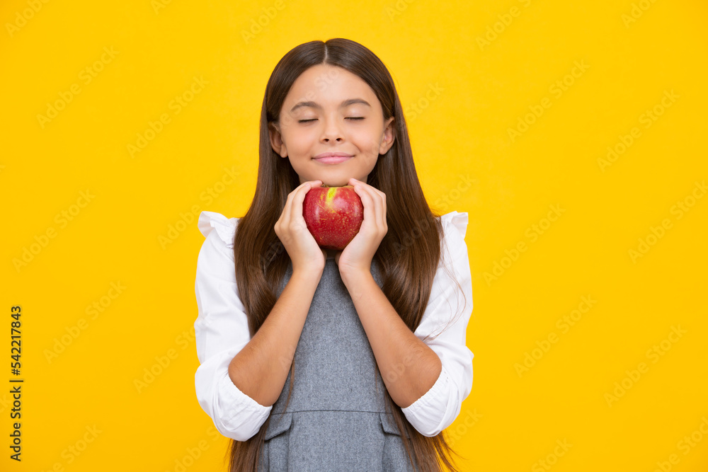 Teenager child girl biting tasty green apple. Teenager child girl biting tasty green apple.
