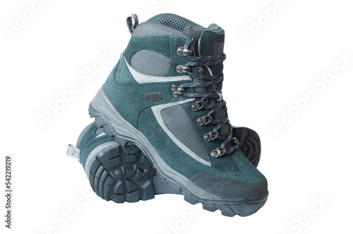 men's trekking boots on a white background. mountain men's tourism concept. hiking boots on light texture. shoes for working on light surfaces