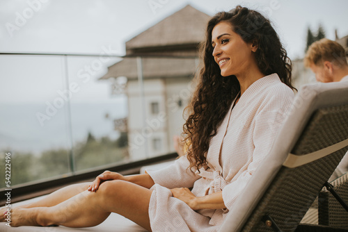 Young couple relaxing on be...