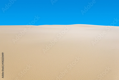 desert landscape  sand dunes under blue sky