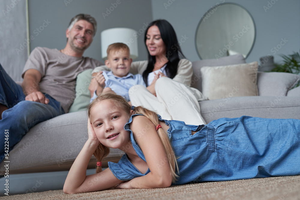 happy family mother father and children at home