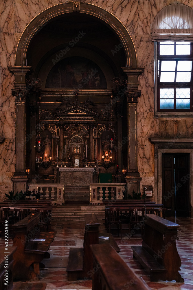 Fototapeta premium dark interior of a gothic baroque church in Venice, Italy