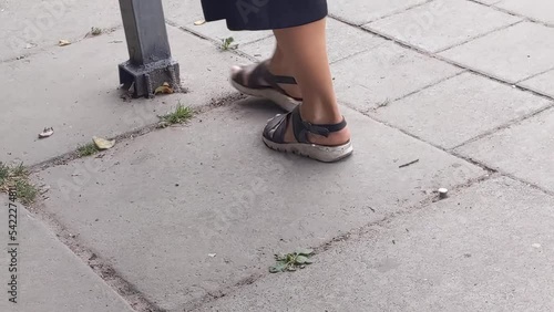 woman walking in sandals