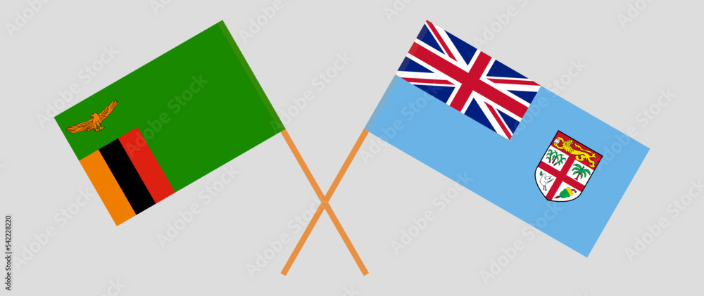 Crossed flags of Zambia and Fiji. Official colors. Correct proportion