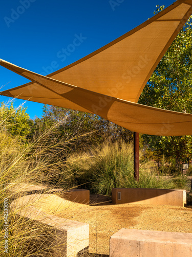 Triangle sun shade sail canopy in southwestern public city park