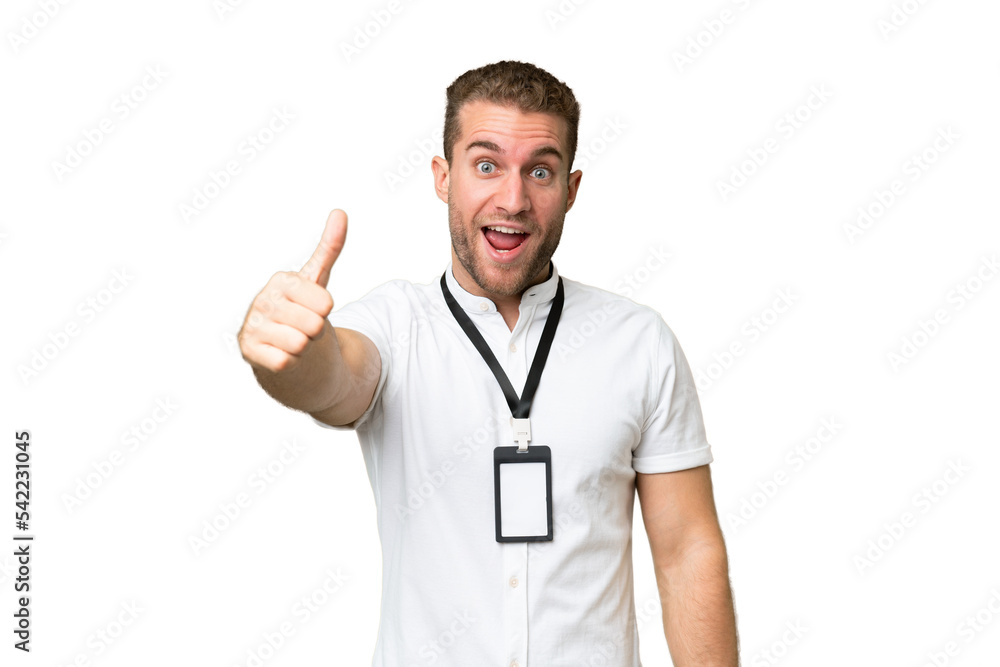Young caucasian man with ID card isolated on green chroma background with thumbs up because something good has happened Young caucasian man with ID card isolated on green chroma background with thumbs up because something good has happened