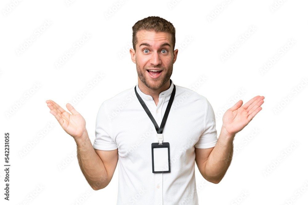 Young caucasian man with ID card isolated on green chroma background with shocked facial expression Young caucasian man with ID card isolated on green chroma background with shocked facial expression