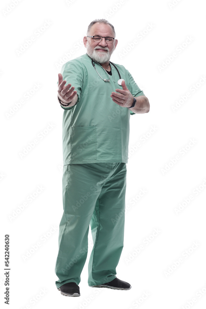 in full growth. smiling adult doctor looking at the camera in full growth. smiling adult doctor looking at the camera
