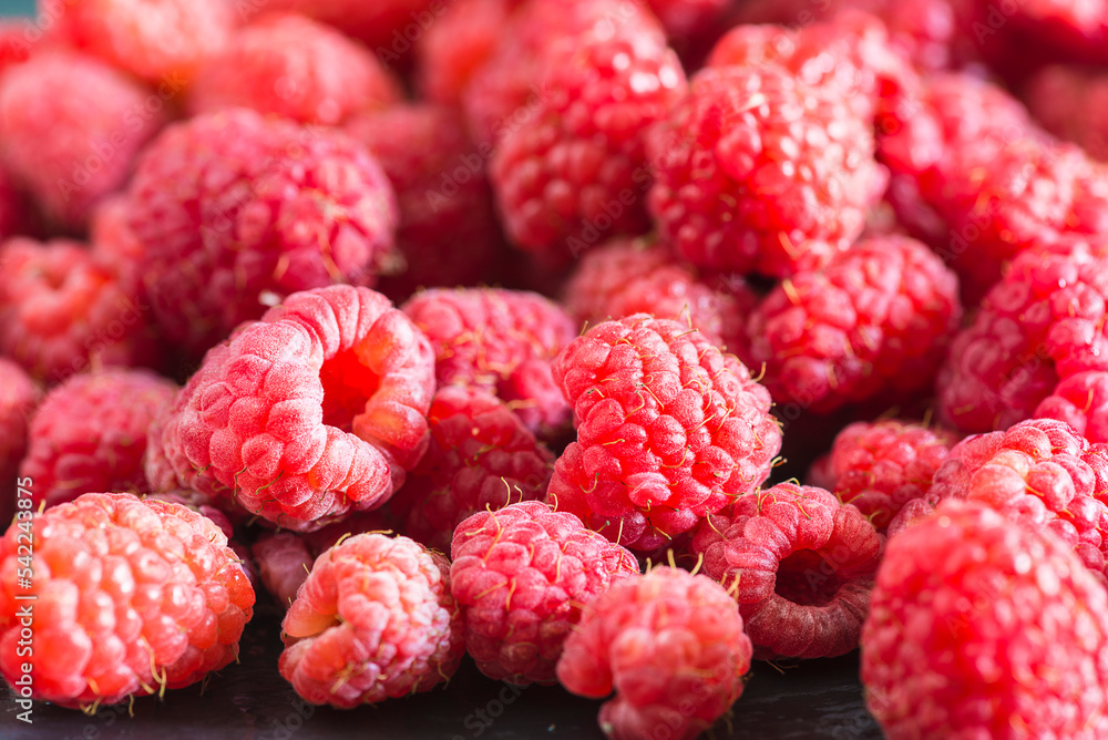 Close up for red raspberries on sunlight Close up for red raspberries on sunlight