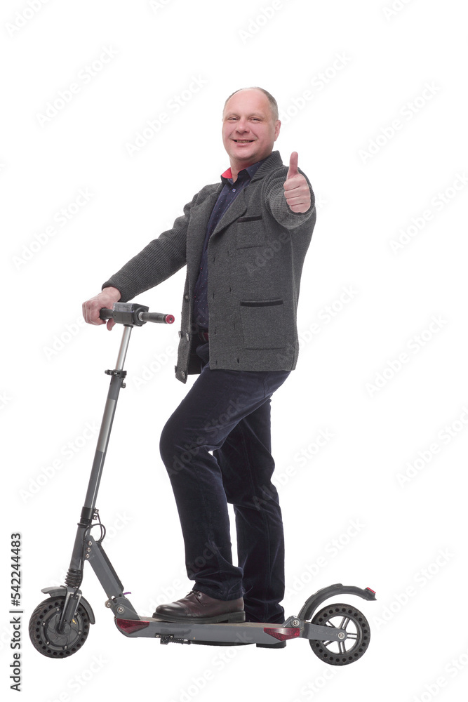 happy casual man with electric scooter .isolated on a white background. happy casual man with electric scooter .isolated on a white background.
