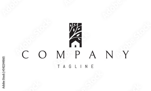 Vector logo on which an abstract image of a house on a wood background.