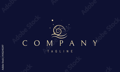 Vector golden logo on which an abstract image of a seashell with two waves at the base.