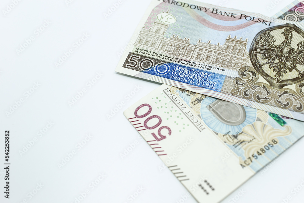 500 zloty - Polish banknote. Polish currency on a white background arranged in a pattern. Illustrates cash flow and business 500 zloty - Polish banknote. Polish currency on a white background arranged in a pattern. Illustrates cash flow and business
