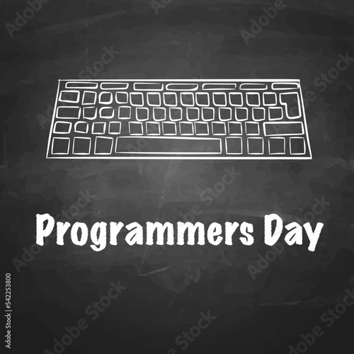 keyboard drawn with chalk on a blackboard and an inscription "programmers day"