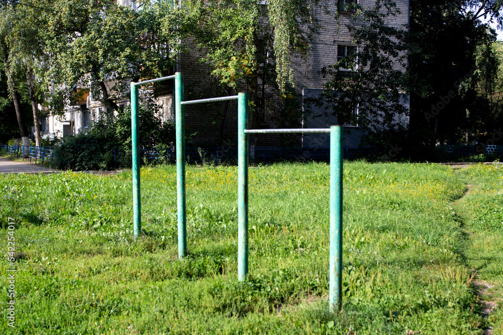 iron horizontal bars for sports in the yard.