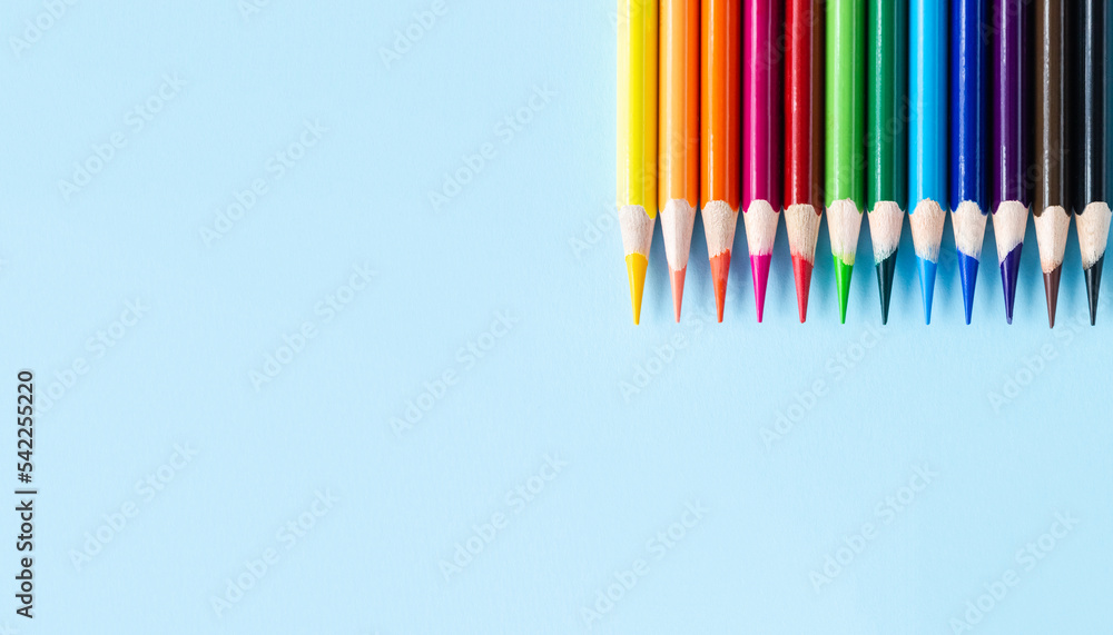 Multicolored pencils on pastel background. Tolerance and diversity concept. Selective focus, copy space Multicolored pencils on pastel background. Tolerance and diversity concept. Selective focus, copy space