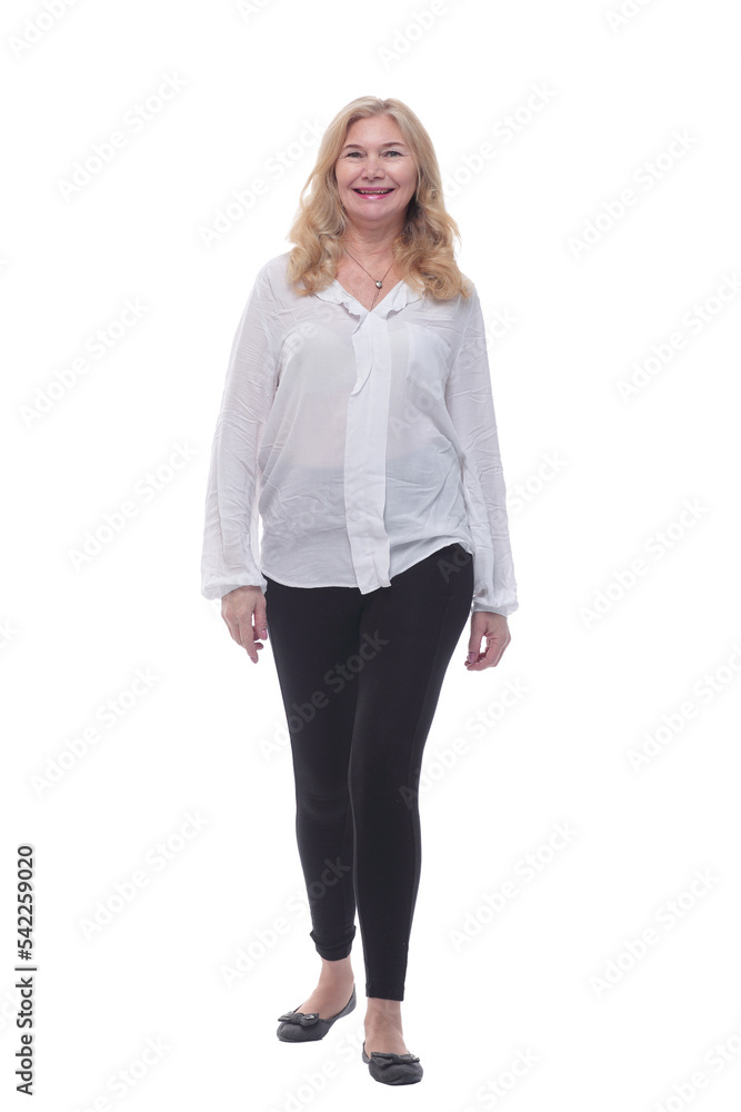 happy mature woman in a new blouse striding forward. happy mature woman in a new blouse striding forward.