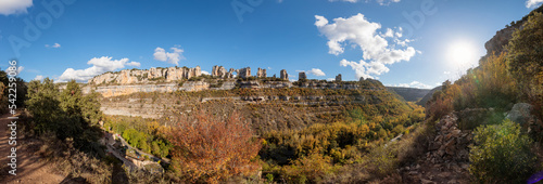 Panoramic Landscape of Orbaneja del Castillo, Spain, with Cliffs and Autumn Forest