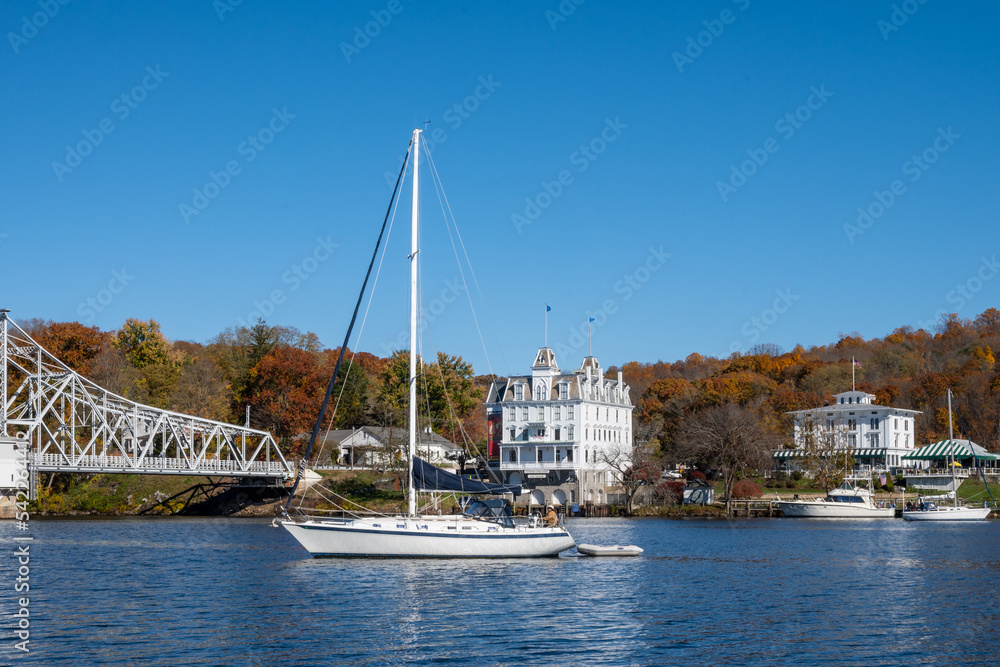 Sailing on the Connecticut River near the landmarks of the East Haddam Swing Bridge, the Goodspeed Opera House, and the Gelston House. 