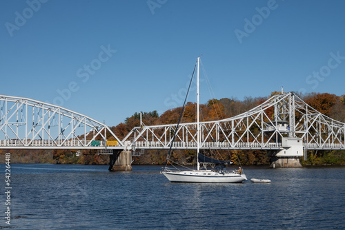 Sailing on the Connecticut River near the East Haddam Swing Bridge on a beautiful autumn day. 