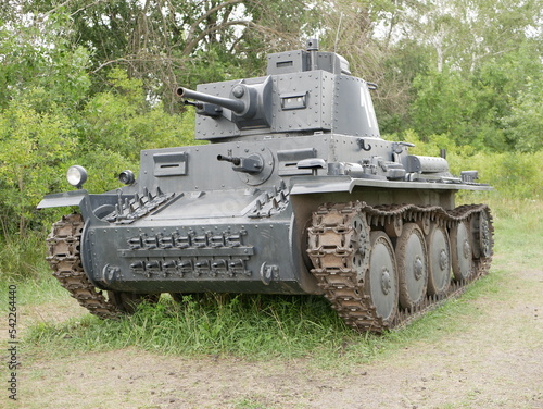 Czechoslovak light tank of the Second World War, which was in service with the Wehrmacht. A tank painted dark gray on a forest road.