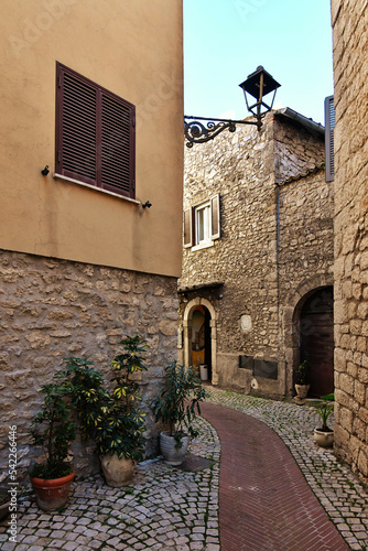 A small street between ancient buildings in Boville Ernica, a historic town in the province of Frosinone, Italy. photo