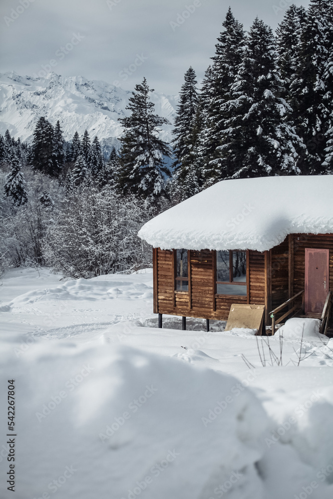 wooden hut in the mountains in winter wooden hut in the mountains in winter