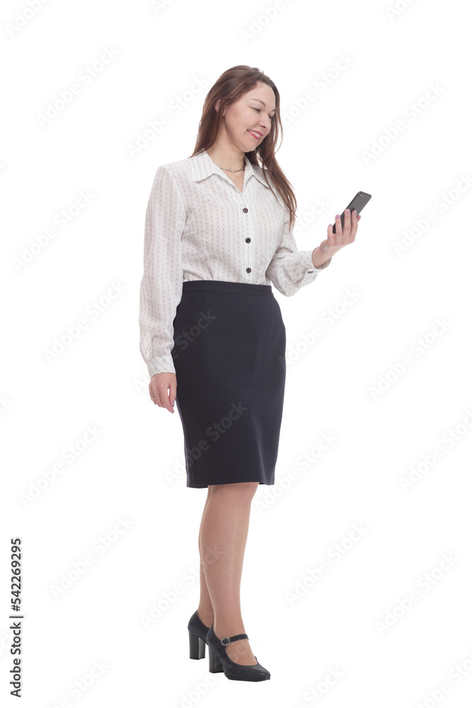 in full growth. smiling business woman with a smartphone . in full growth. smiling business woman with a smartphone .
