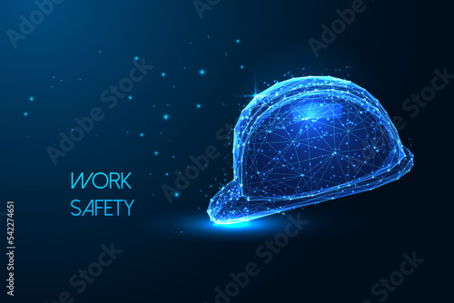 Concept of work safety with safety construction helmet in futuristic polygonal style on dark blue