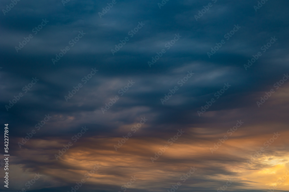 Dramatic clouds at sunrise. Weather background photo
