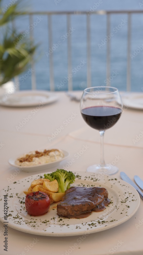 grilled meat presentation on a white plate grilled meat presentation on a white plate