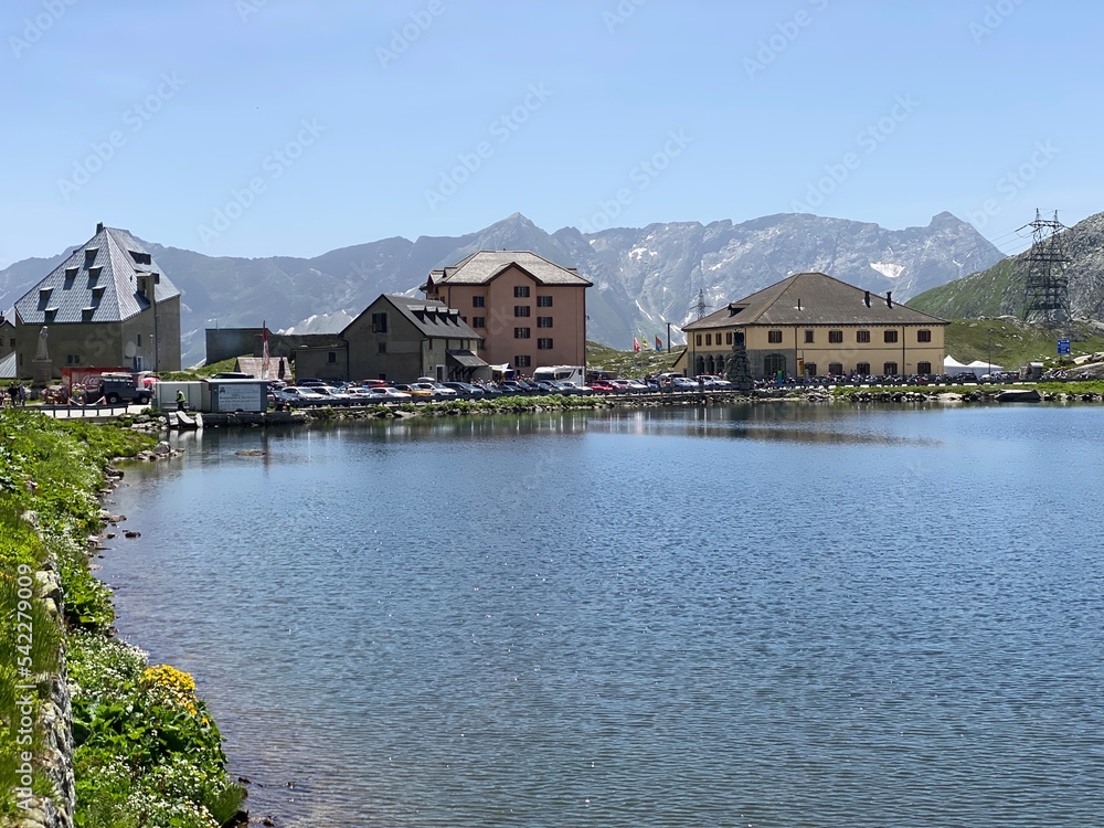 Summer atmosphere on the Lago della Piazza lake (Lake of the Piazza) in the Swiss alpine area of the mountain St. Gotthard Pass (Gotthardpass), Airolo - Canton of Ticino (Tessin), Switzerland (Schweiz