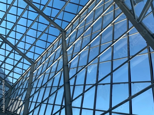 Abstract high-tech architecture background photo  internal structure of glass roof arch with lockable windows sections