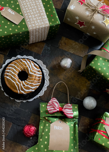 Handmade christmas presents wrapped with love: ornaments, cake, and gifts.
