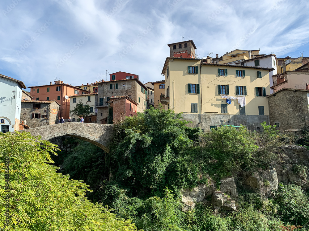 Loro Ciuffenna, Tuscany, Italy. Loro Ciuffenna village view, Tuscany. Loro Ciuffenna, Arezzo, Tuscany, Italy view of the stream that crosses the ancient medieval village with the oldest water mill