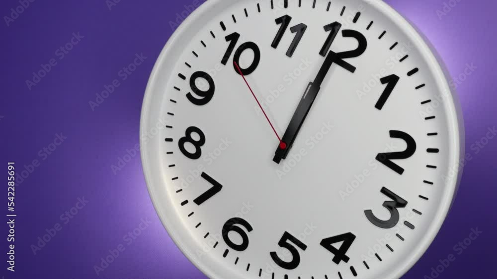 A White Wall Clock On Purple Background With A Time Of 12.00 Am Or Pm. A Black Hands and Red Second Hand Of The Clock. 4k. ProRes. A White Wall Clock On Purple Background With A Time Of 12.00 Am Or Pm. A Black Hands and Red Second Hand Of The Clock. 4k. ProRes.