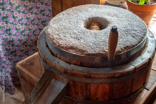 Fotografi Old Millstones for the mill, close-up photo.