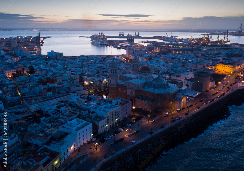 Panoramic view from drone of night spanish city of Cadiz
