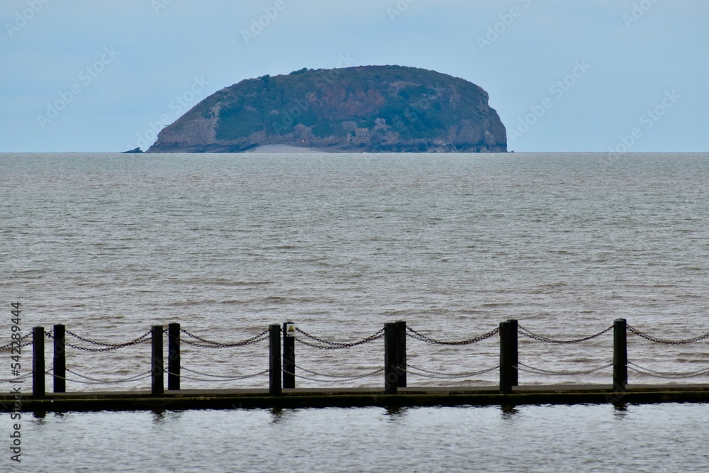 View of the Whale island behind the Ponton bridge on the Bristol Channel, Weston-super-Mare, England, UK