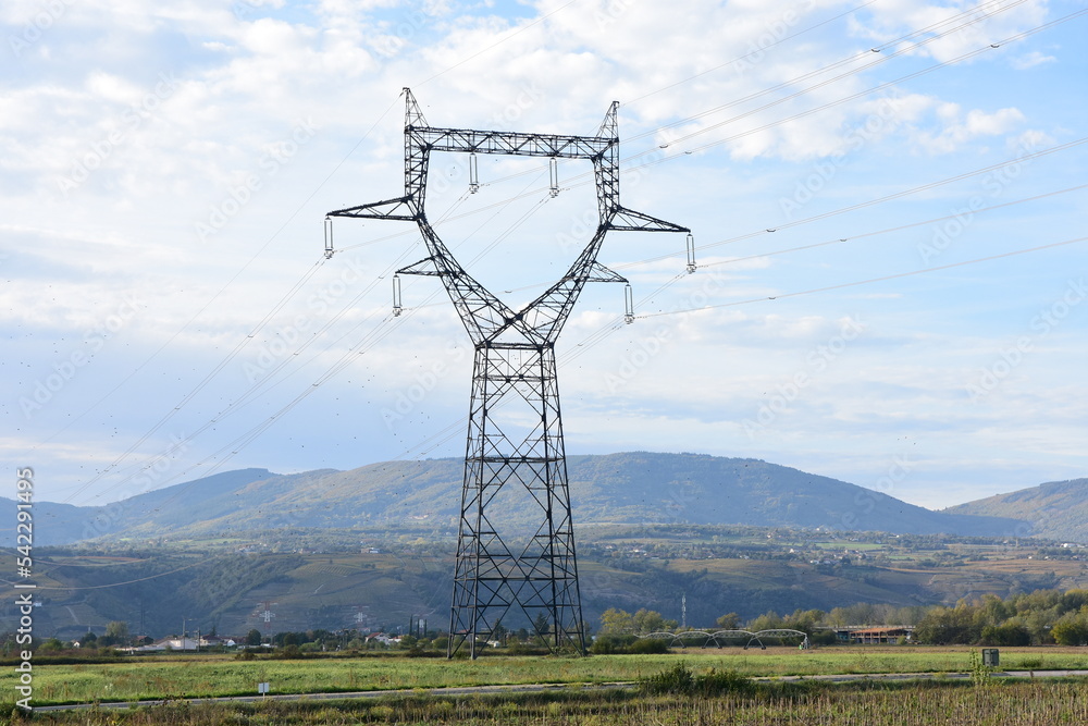 Electric pylon in an agricultural field in France.