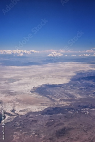 Salt Flats in Utah. Salt Flats Landscape. Blue Sky and Snow-White Salt Soil. Bonneville Salt Flats © Jeremy