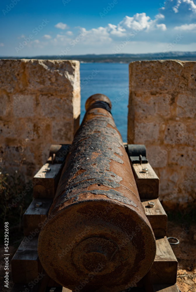 old, rusted cannon in the fortress on comino island in malta