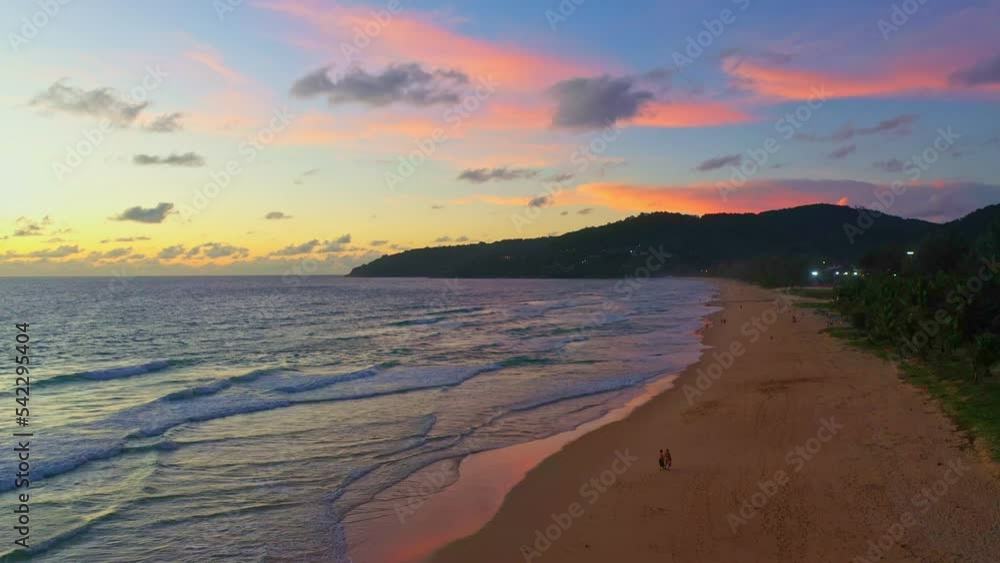 aerial view sweet sky in sunset above the ocean at Karon beach Phuket. .abstract nature background..Sunset with sweet color light rays and other atmospheric effects..aerial photography 4k resolution. aerial view sweet sky in sunset above the ocean at Karon beach Phuket. .abstract nature background..Sunset with sweet color light rays and other atmospheric effects..aerial photography 4k resolution.