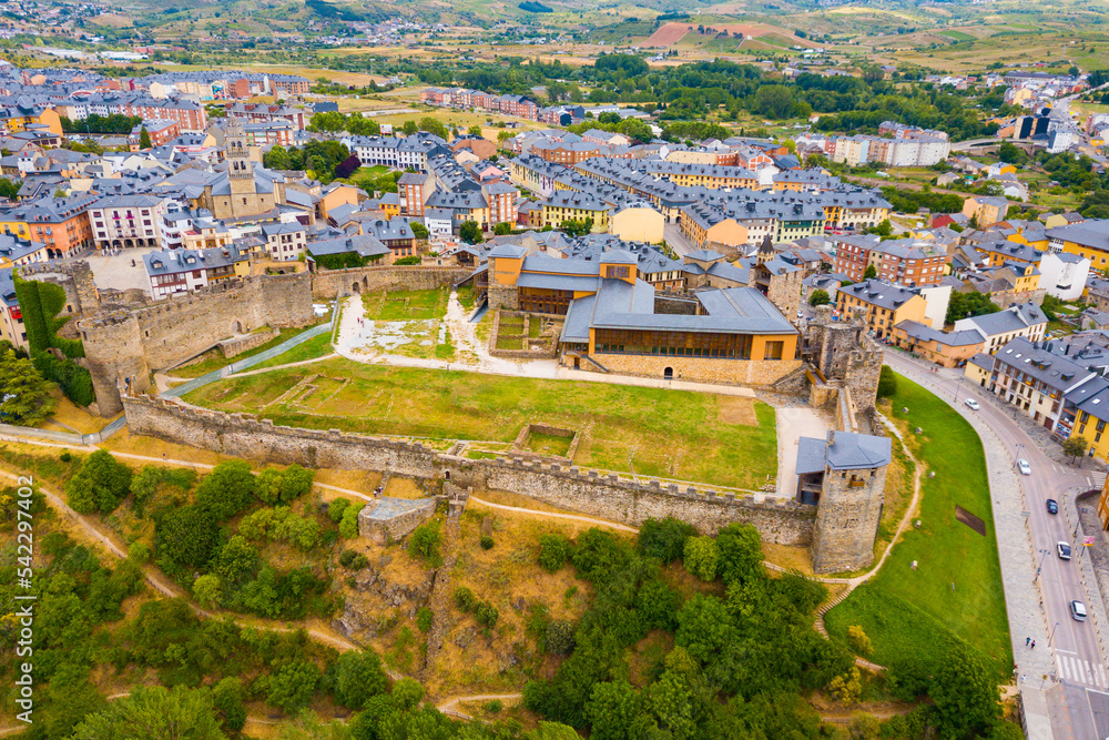 View from drone of residence districts of Ponferrada and Templar castle, Spain