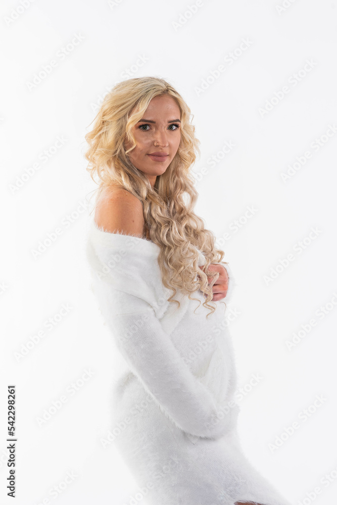 A Gorgeous Glowing Young Mother Poses In A Studio Environment In Her Second Trimester A Gorgeous Glowing Young Mother Poses In A Studio Environment In Her Second Trimester