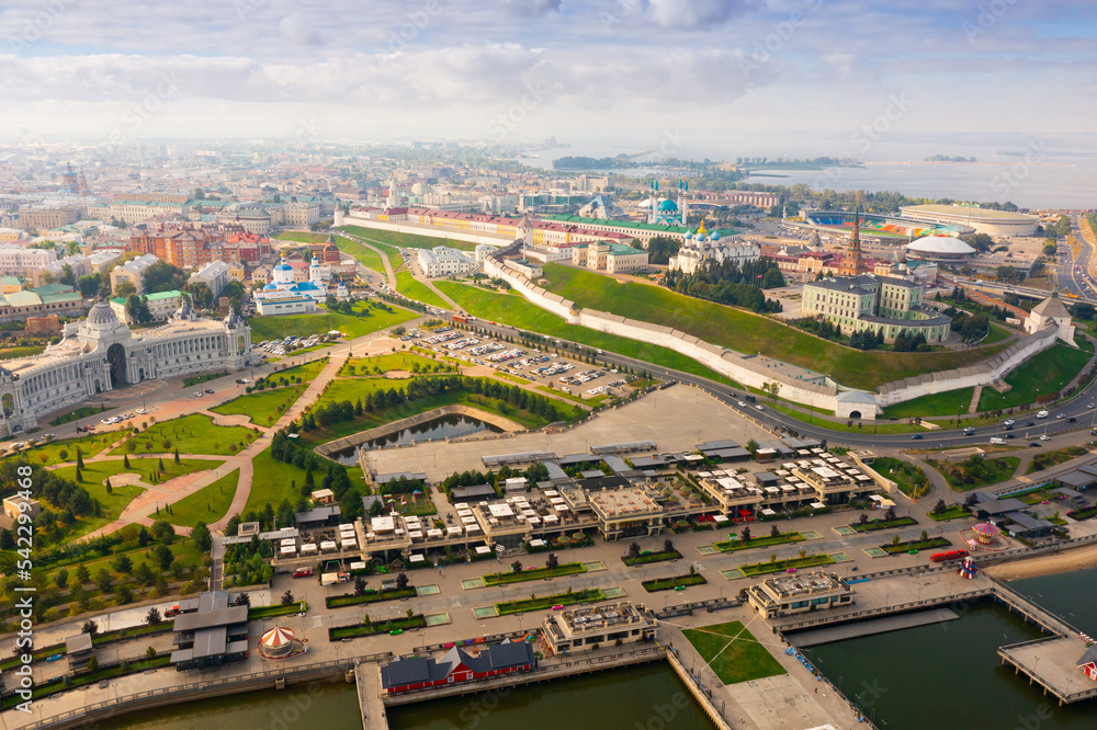 Scenic view from drone of summer Kazan cityscape with walled Kremlin on banks of Volga river, Russia.